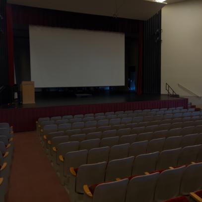 Stage with presentation in auditorium