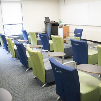 Stationary seating with lectern in background