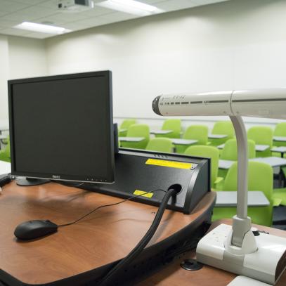 Lectern with movable furniture in background